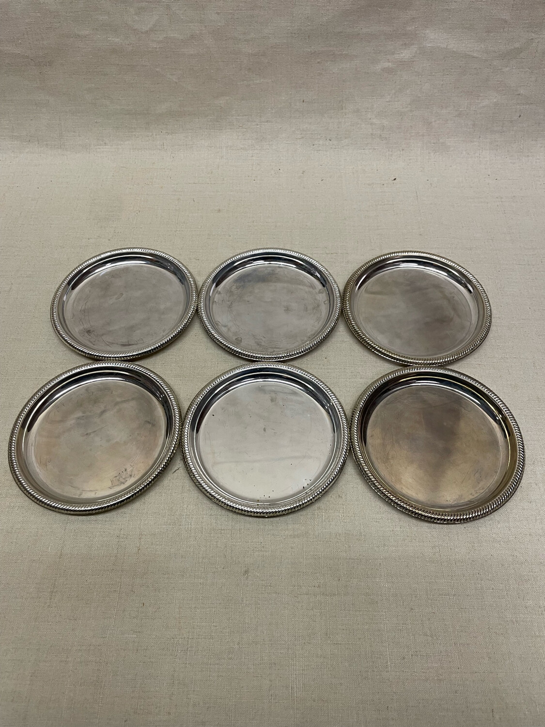 Six dessous de bouteille argentés - Diamètre 10 cm