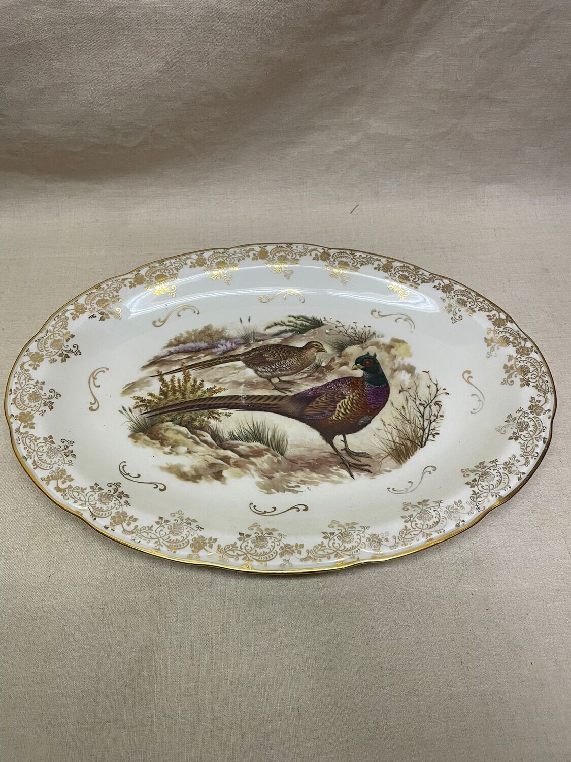 Plat ovale représentant un faisan - 40 x 29 cm
