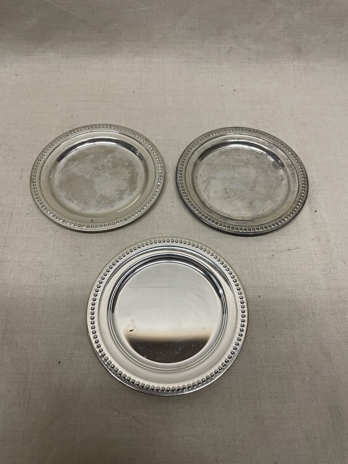 Ensemble de trois dessous de bouteille - 11 cm