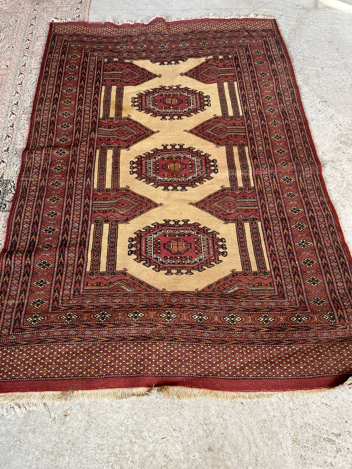 ORIENT. Tapis en laine à fond beige et marron - 186 x 123 cm