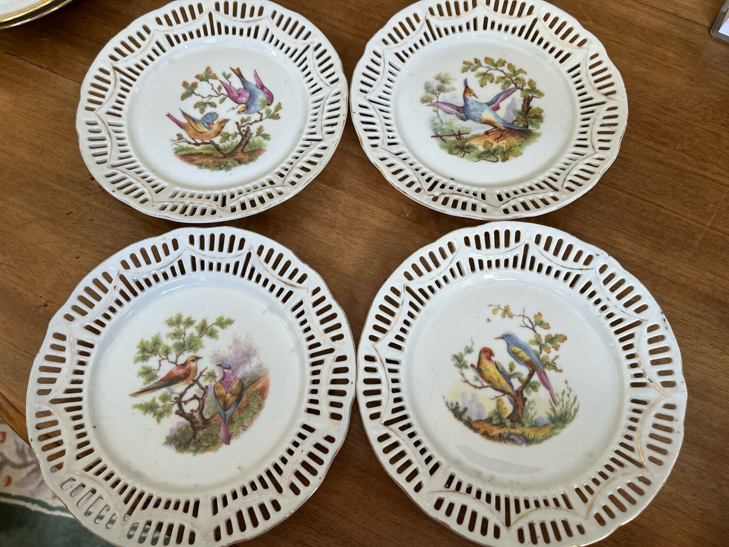 Lot de 4 assiettes murales avec des oiseaux