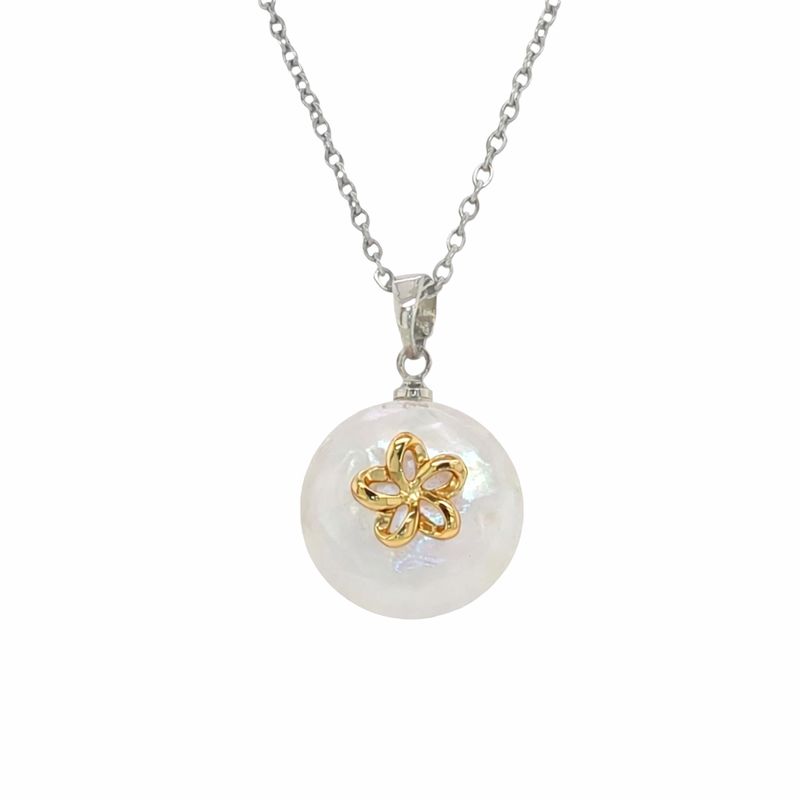 Pearl Pendant with Tail over Waves