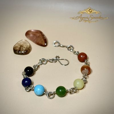 Handgemaakte zilveren chakra armband met zeven natuurlijke edelstenen – Aynur Sieraden