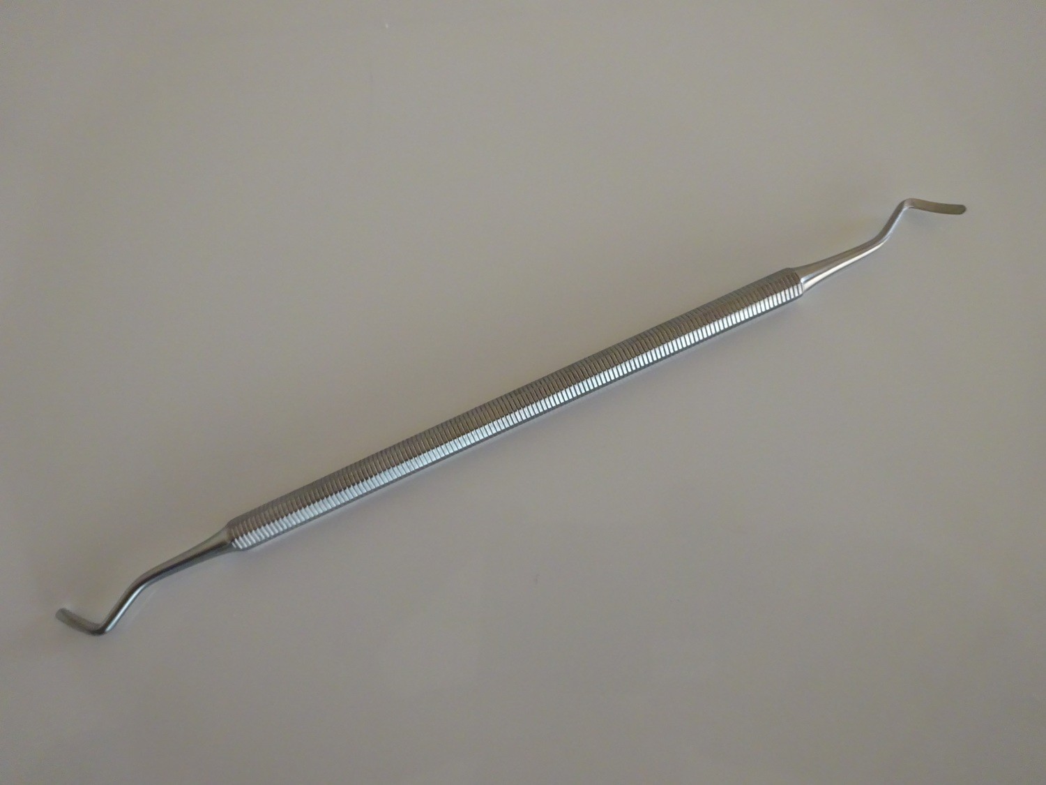 Eckenheber (Nagelfalzreiniger)
