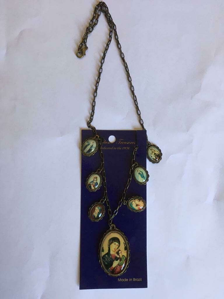 Necklace with medals and Our Lady of Perpetual Help