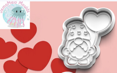 Cookie Cutter Holding Heart Balloon
