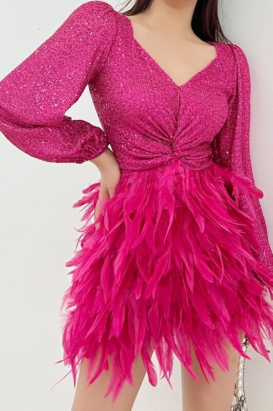 featherme in pink sequin dress