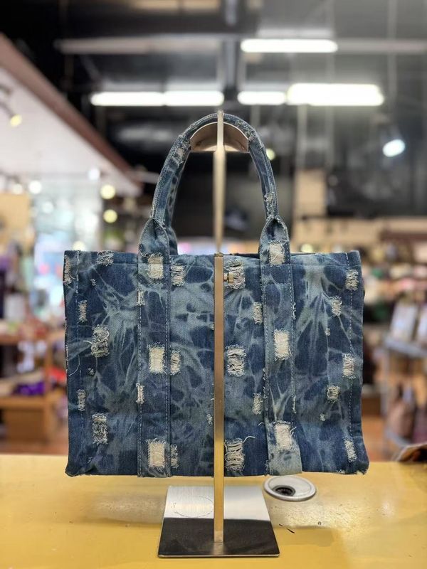 The Denim Luxe Distressed Tote Bag
