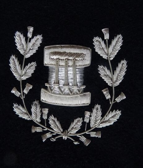 Silver embroidered drum major patch