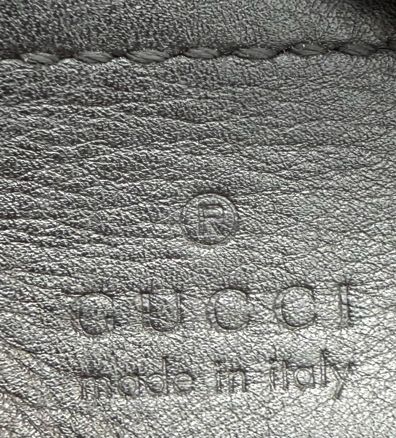 Gucci Monogram Leather Guccissima Clutch Bag