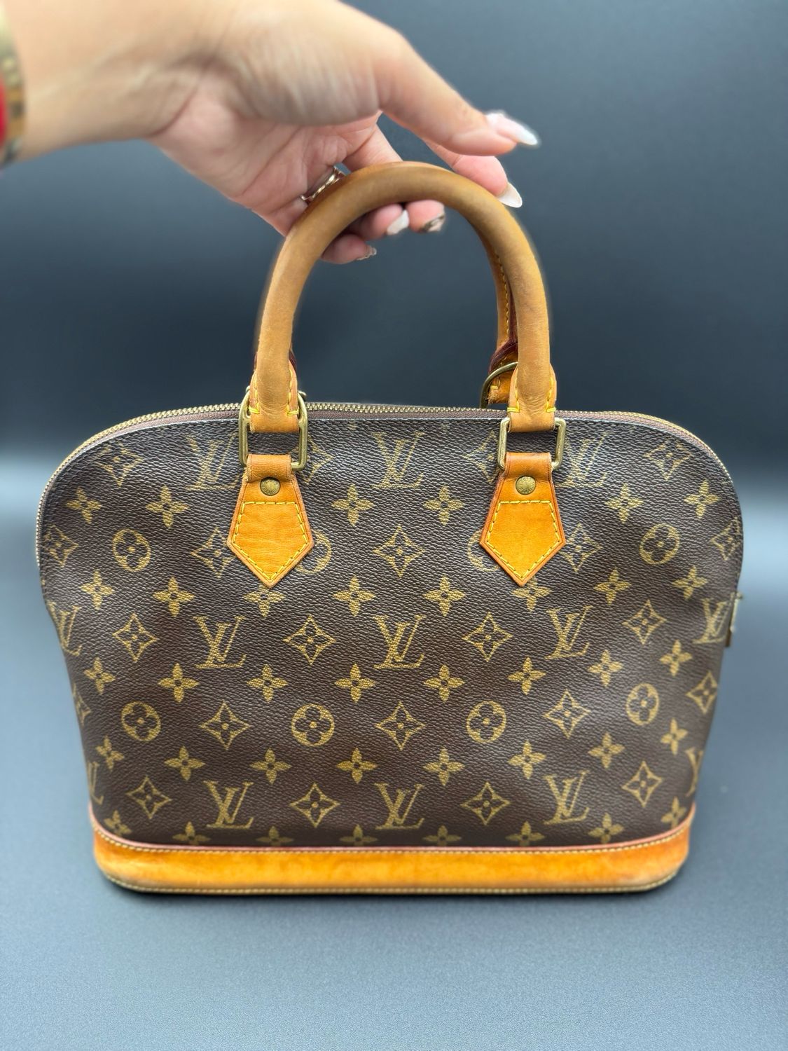 Louis Vuitton Monogram Alma Pm Top Handle Dome Handbag