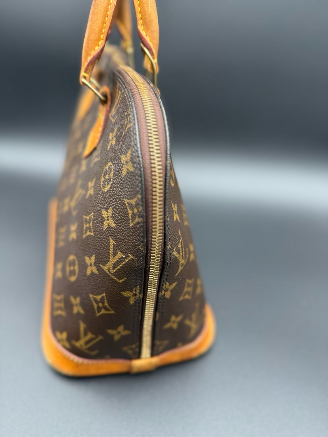 Louis Vuitton Monogram Alma Pm Top Handle Dome Handbag