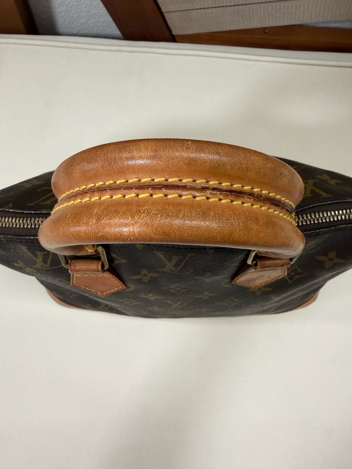 Louis Vuitton Monogram Alma Pm Top Handle Dome