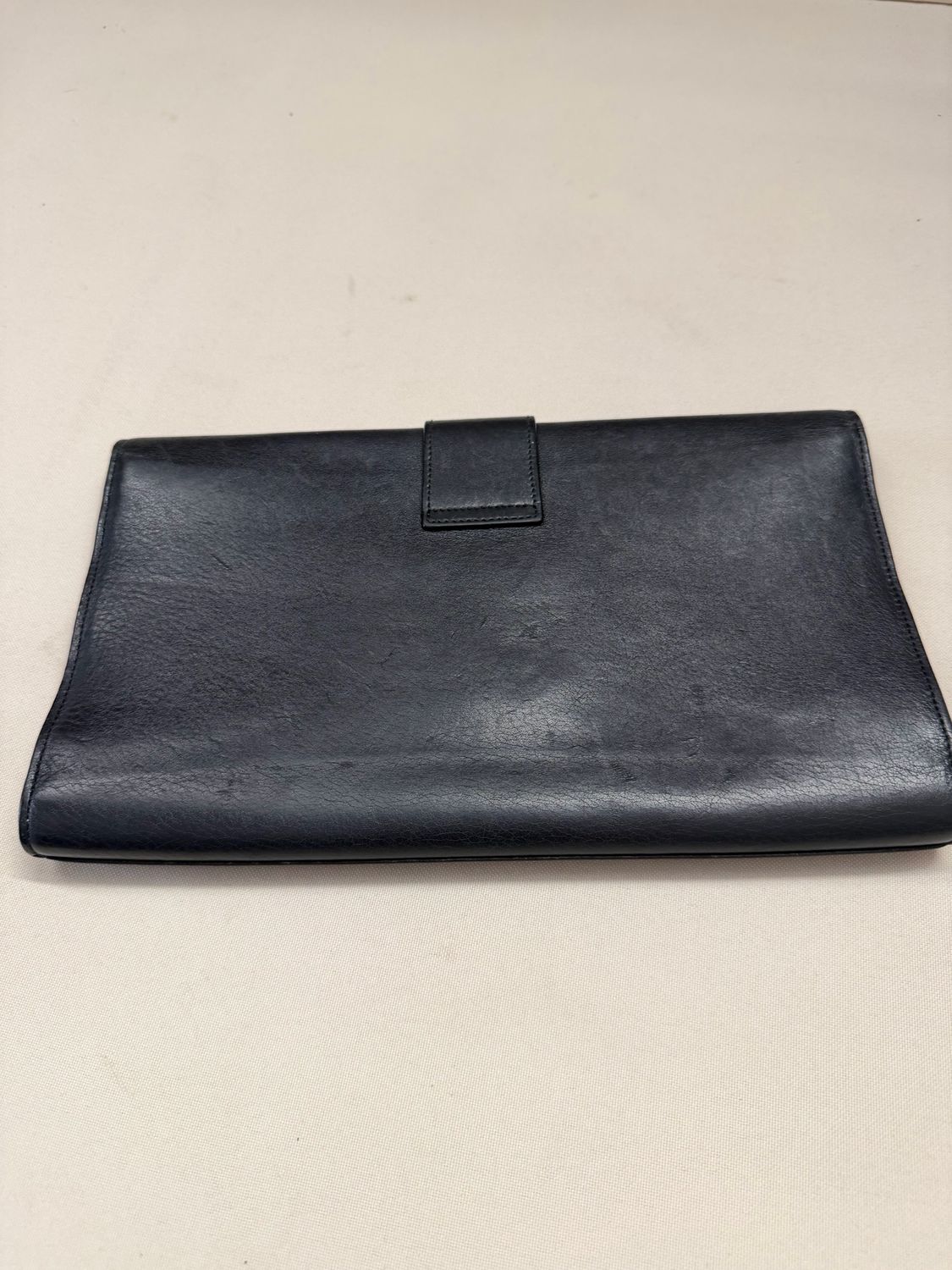 Yves Saint Laurent Clutch Chyc Logo in Black Leather