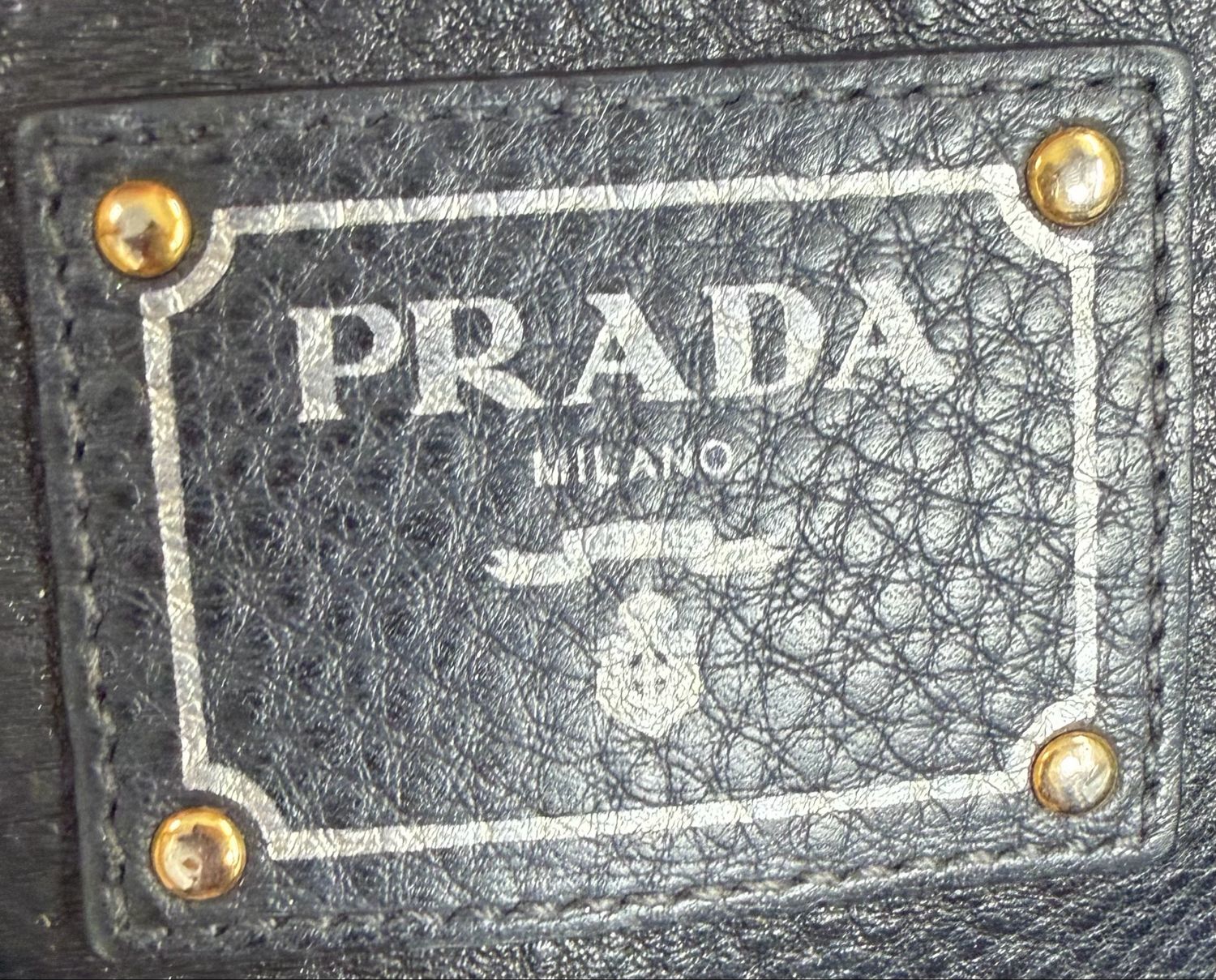 Prada Pebbled Side Pocket Vitello Daino Tote in Black