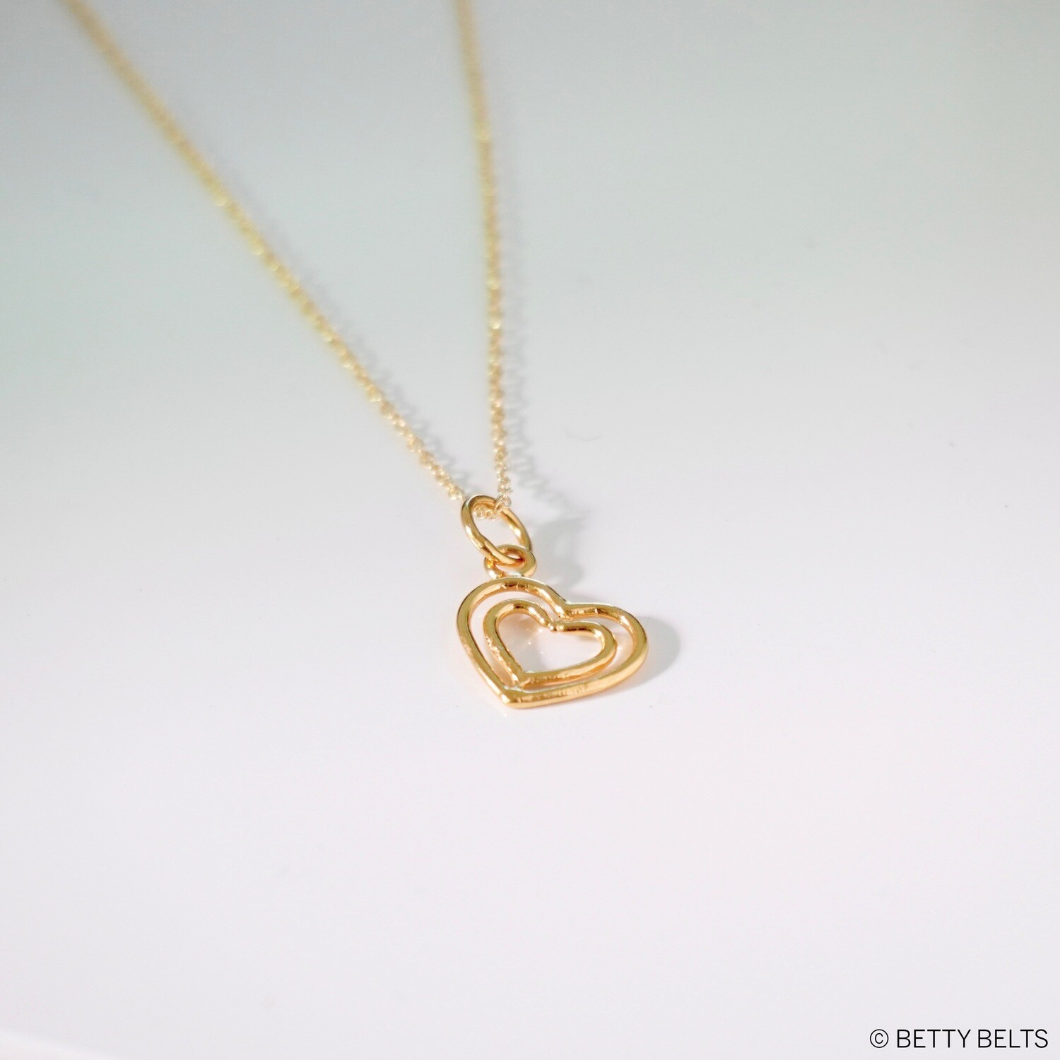 Heart charm paired with 18" gold fill curb chain