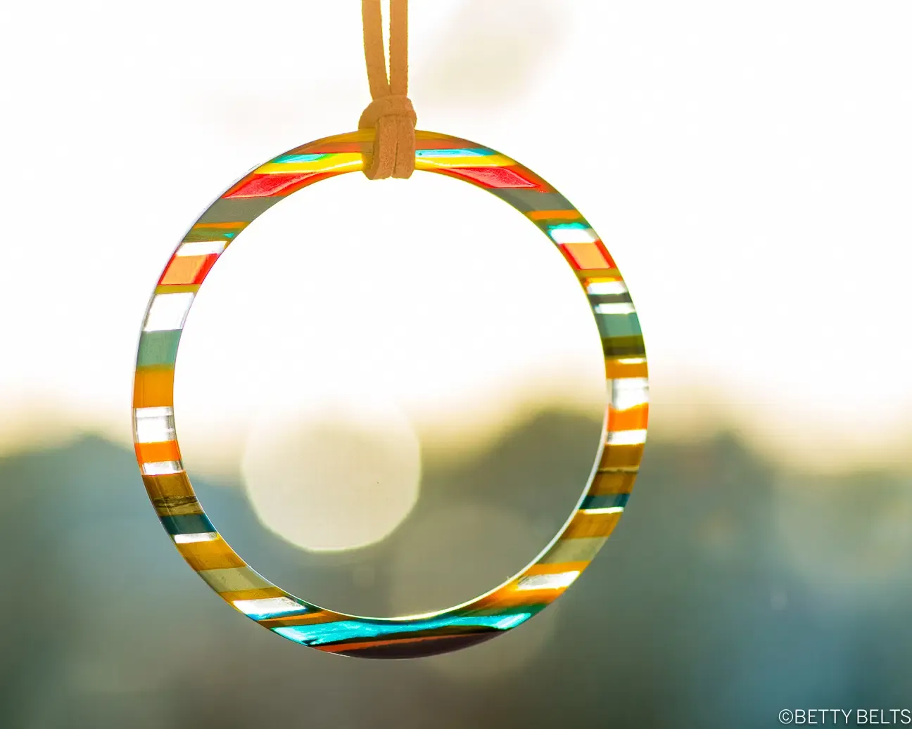 Surfite Sun Catcher on Suede Cord, Sun Catcher Shape: Large hoop (approx. 2.5” width)