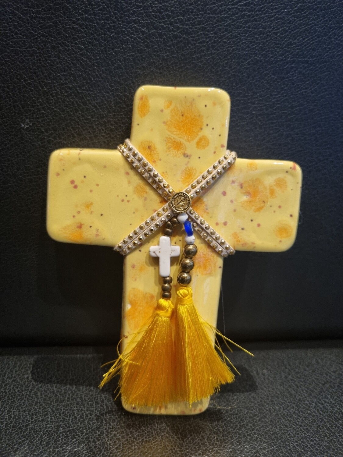 Small yellow ceramic cross