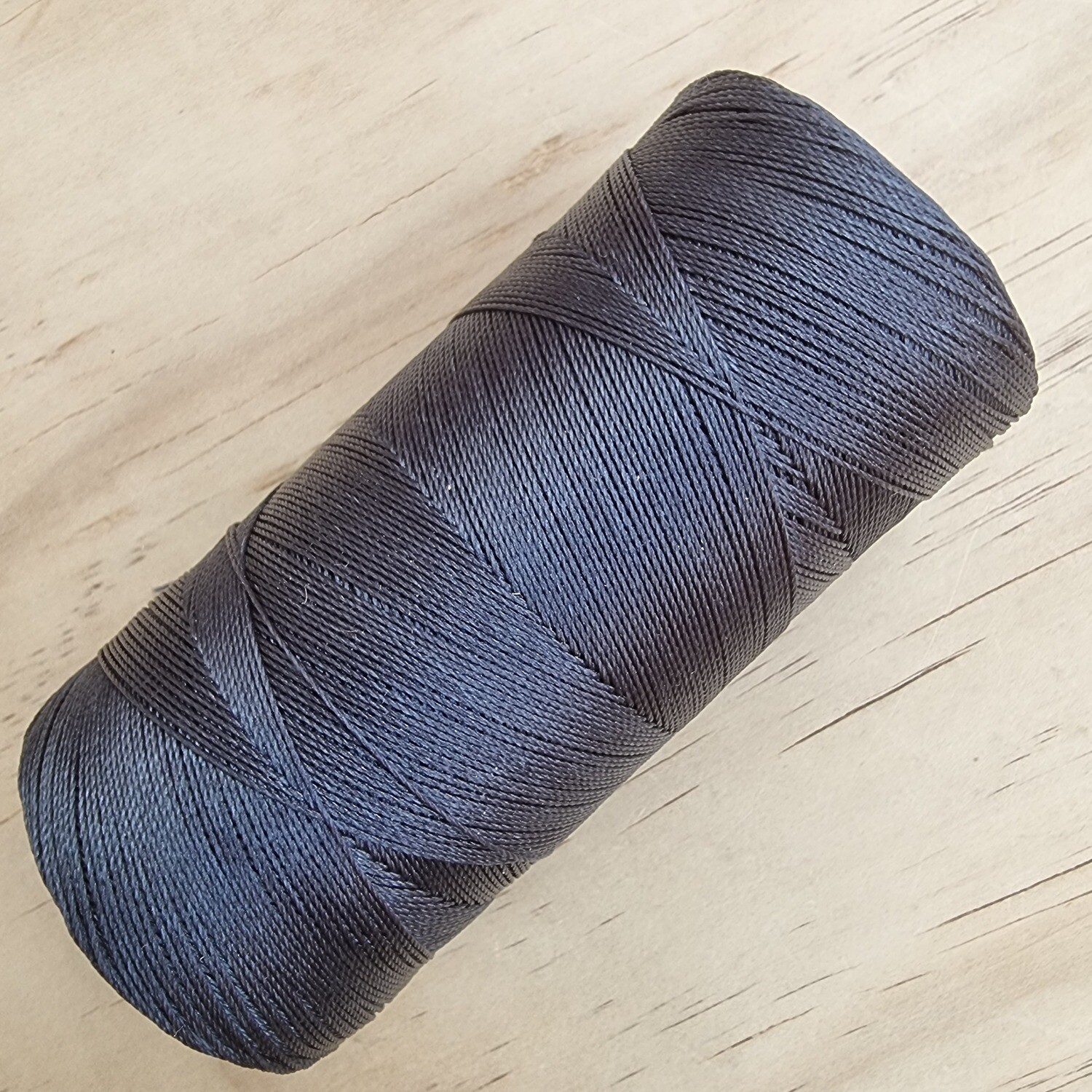 Cor #202 0.35mm 444metre spool of Premium Linhasita 100% Waxed Polyester