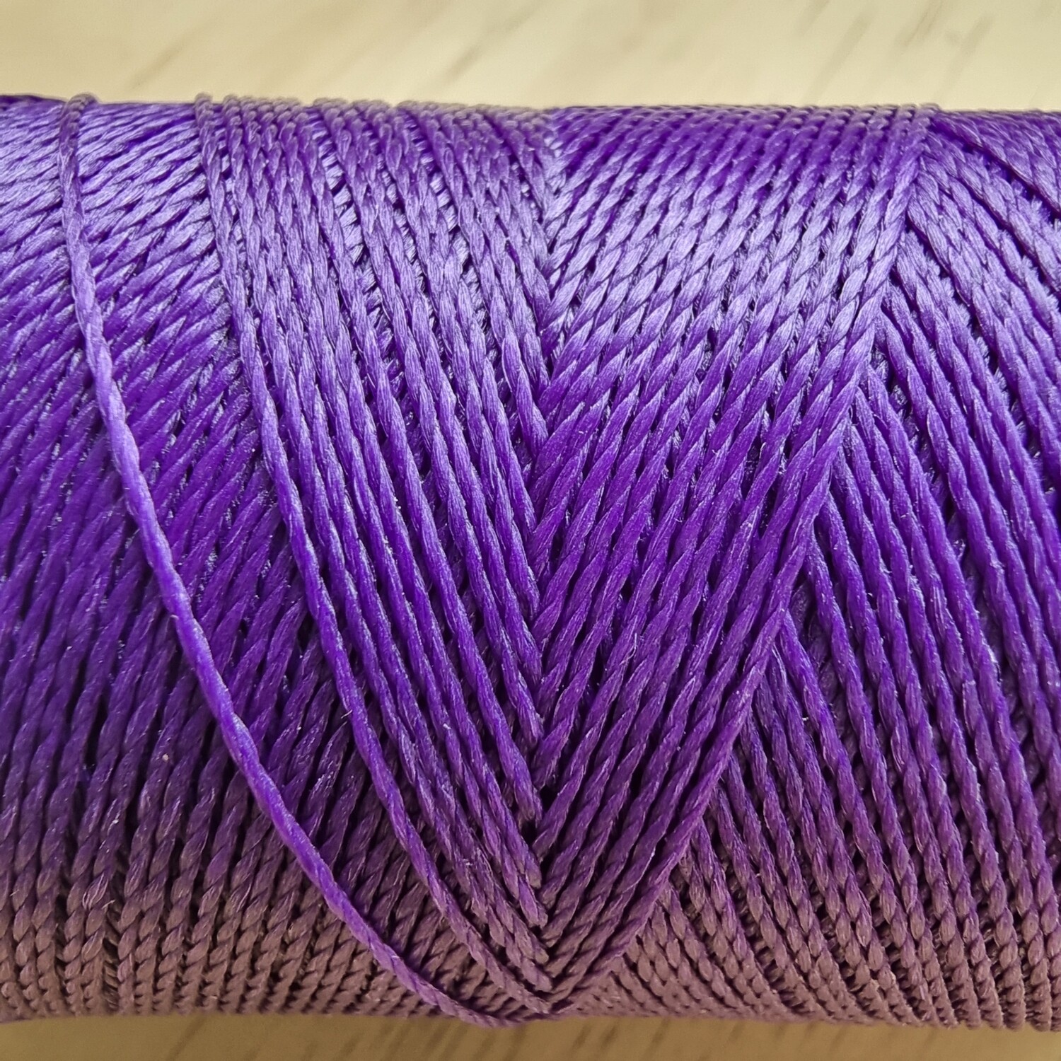 Cor #332 0.5mm 330metre spool of Premium Linhasita 100% Waxed Polyester