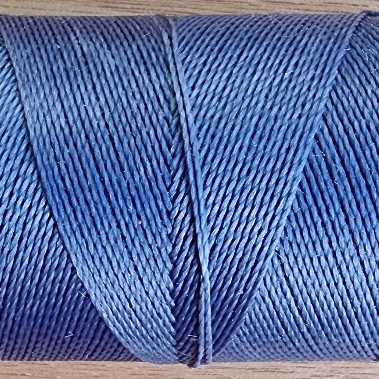 Cor #1037 0.5mm 330metre spool of Premium Linhasita 100% Waxed Polyester