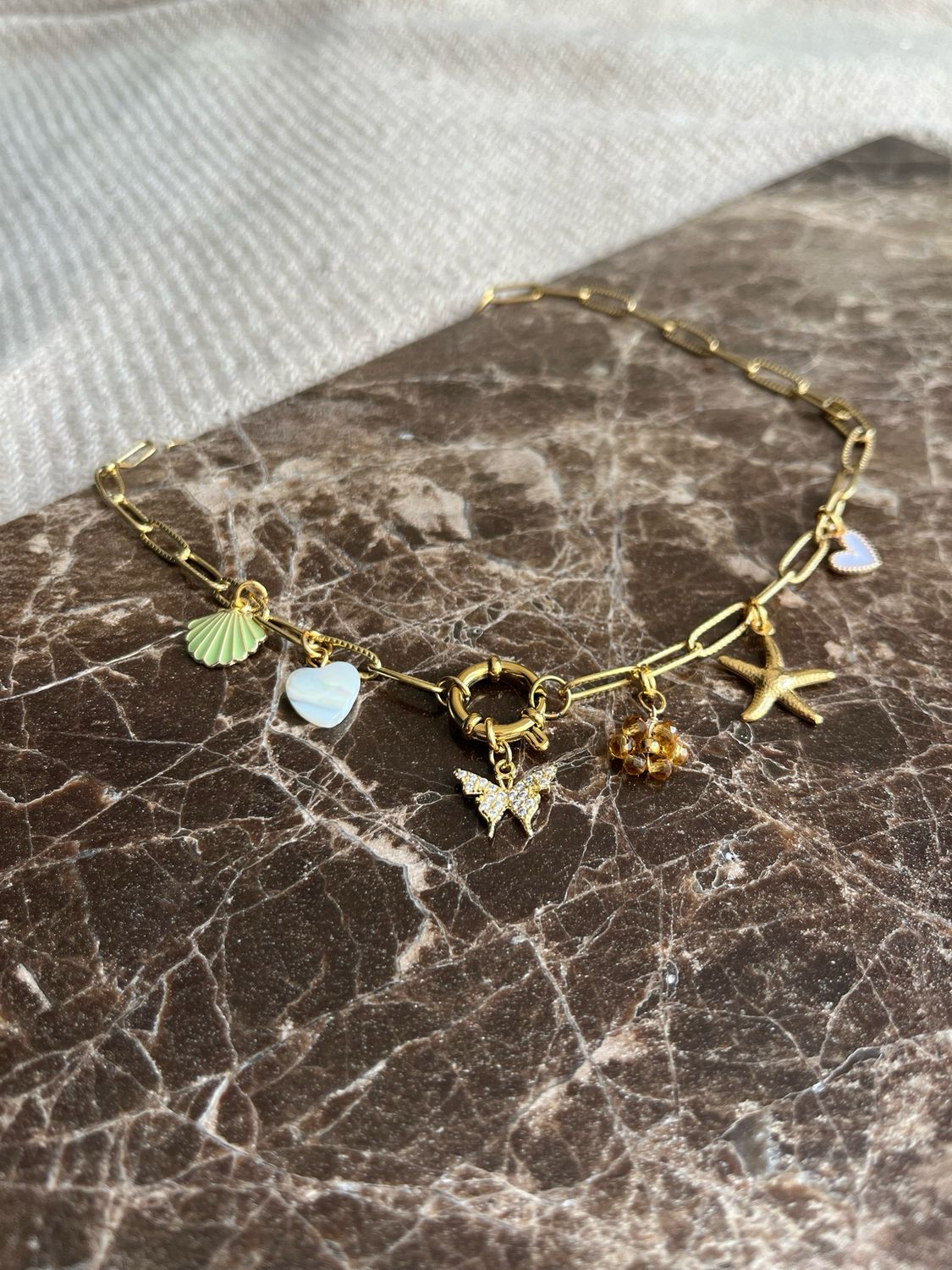 Neutral charm necklace