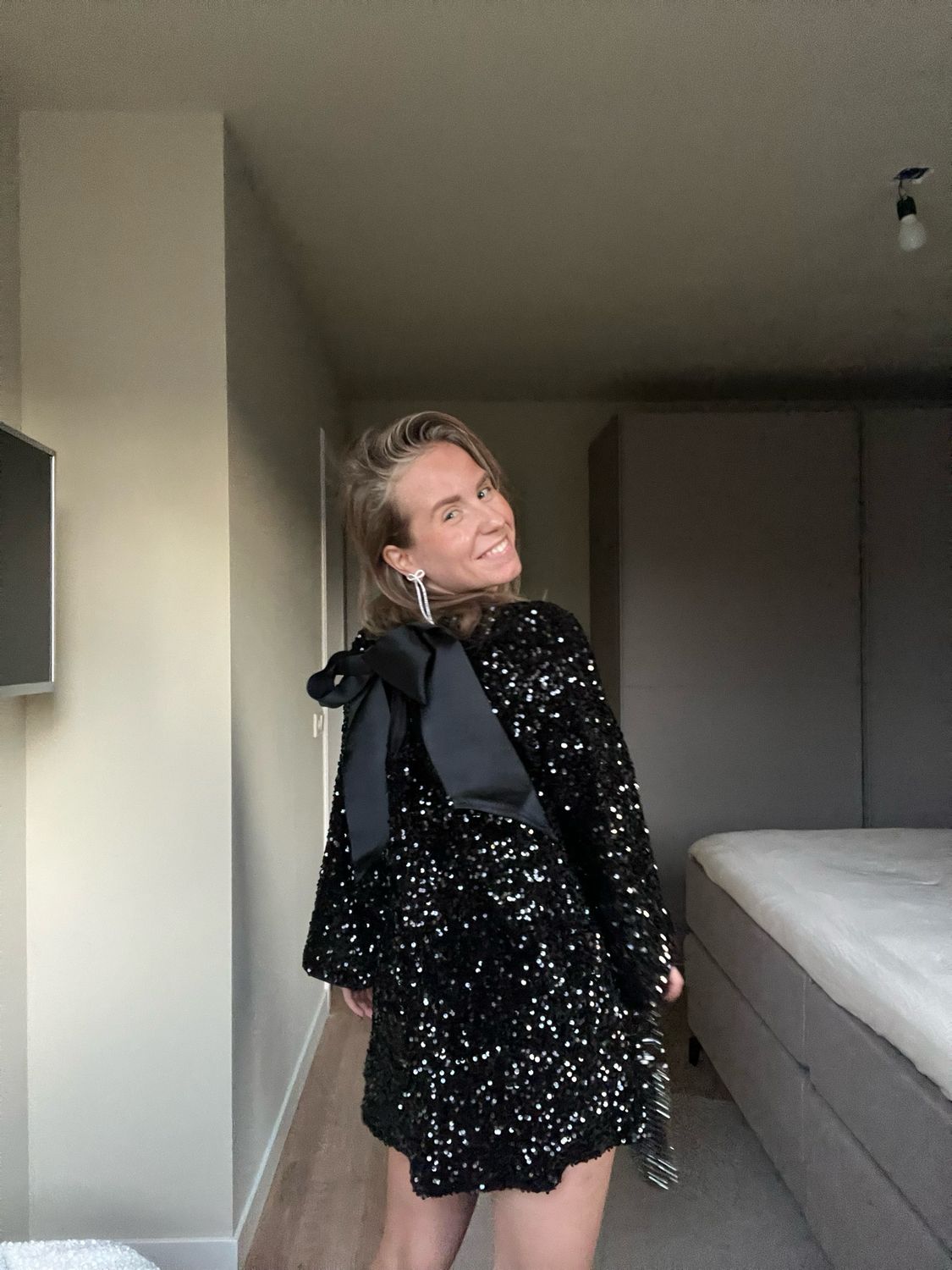 Black glitter bow dress