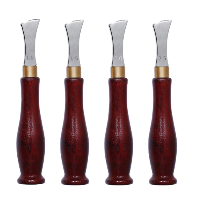 Fileteador de línea o ranura superficial, de acero inoxidable para arte en cuero. Fileteador de línea o ranura superficial, de acero inoxidable para arte en cuero.