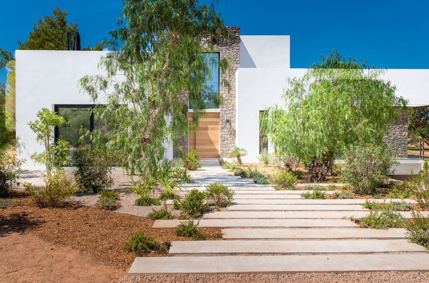 Premium Villa with natural materials, flowing spaces, thick walls, solid doors, all in modern design and with sea view.