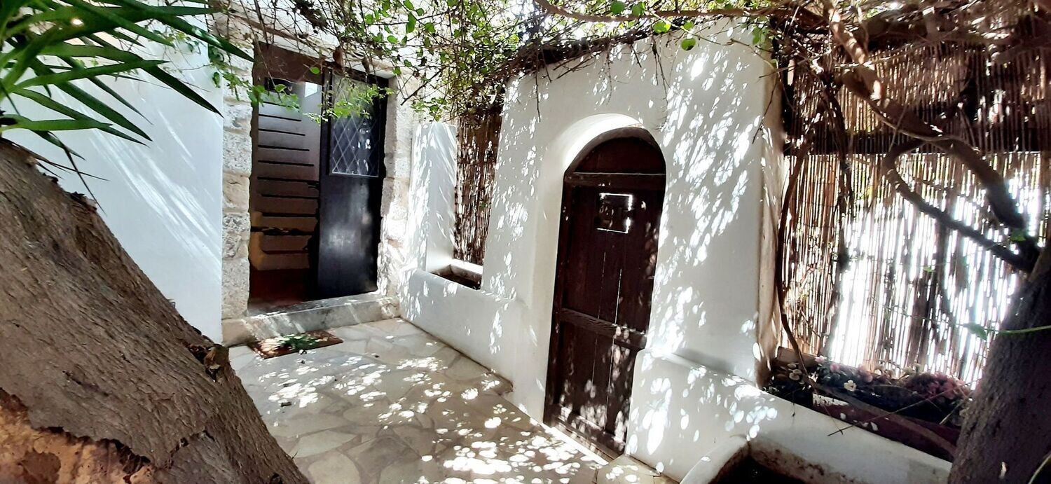 Newly renovated Casa in Dalt Villa with Patio, Roof Terrace and Sea View Real Estate for Sale in Dalt Villa, Ibiza. Entry to the casa