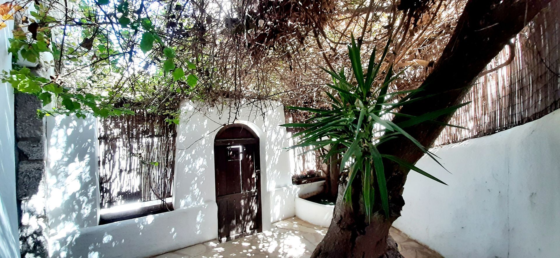 Real Estate for Sale in Dalt Villa, Ibiza. Entry to the casa