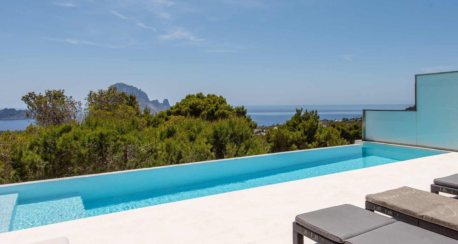 Luxury-Renovated-Turnkey-Object with stunning Views to the Sea and Es Vedra Real Estate for Sale in Cala Carbo, Ibiza: Views to Es Vedra from the Pool