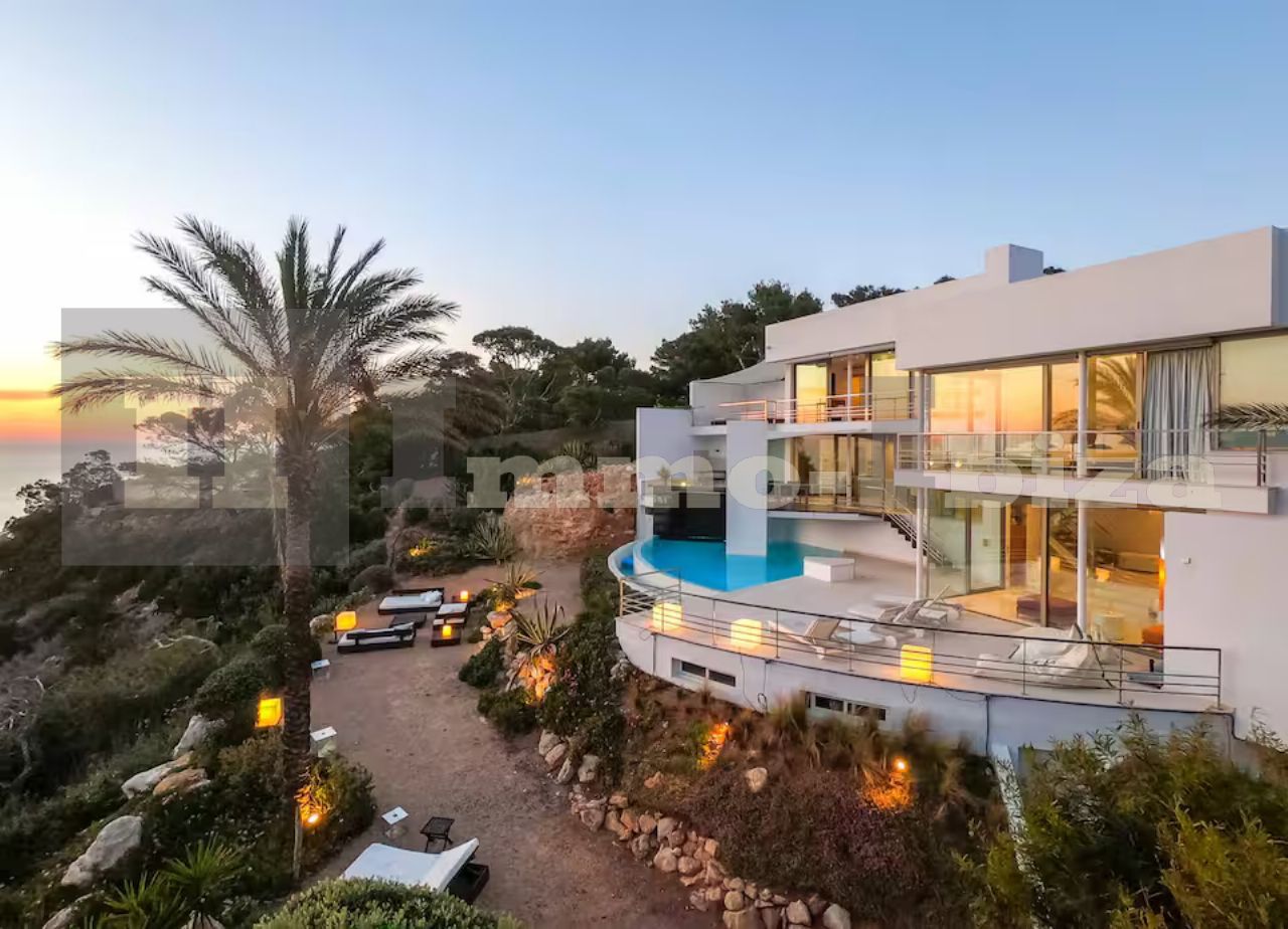 Modern Villa with private Sea Access and Touristic-License at the West Coast Building at Sunset