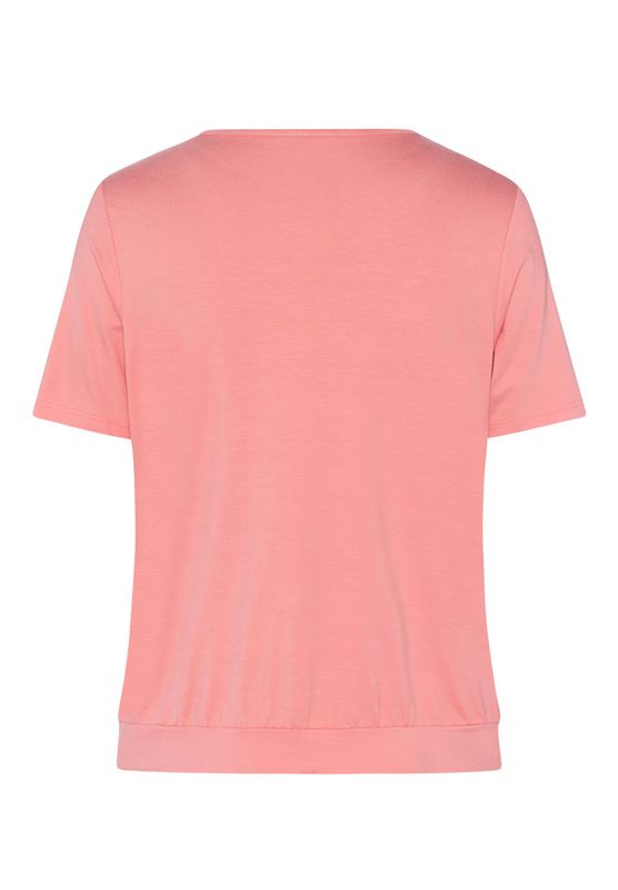 Detail van de modieuze plooien en elastische tailleband Frank Walder oranje shirt