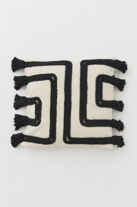 Housse de coussin à pompons