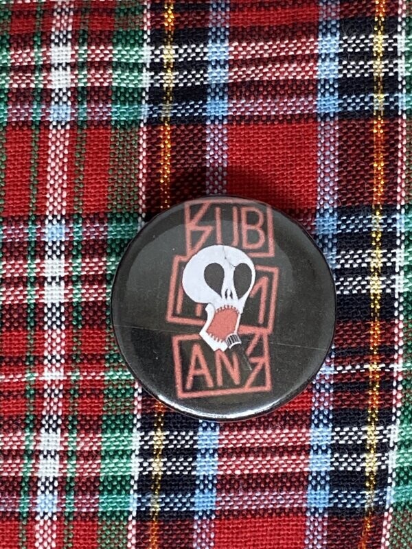 Subhumans Badge