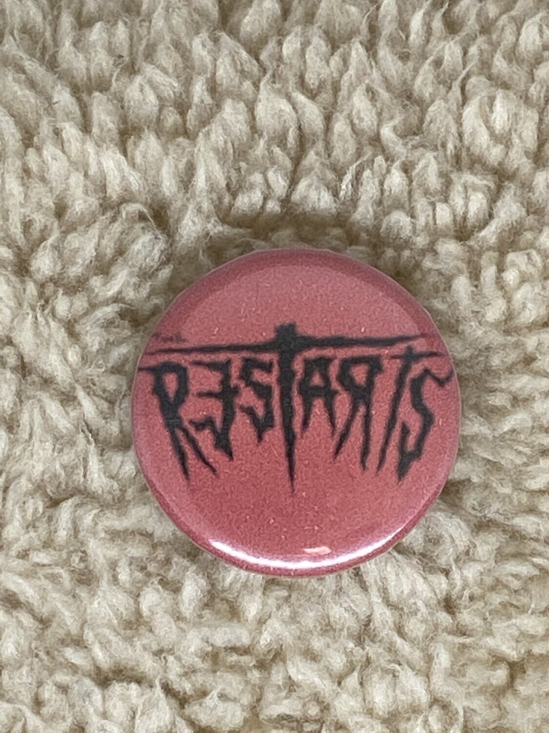 Red Restarts Badge
