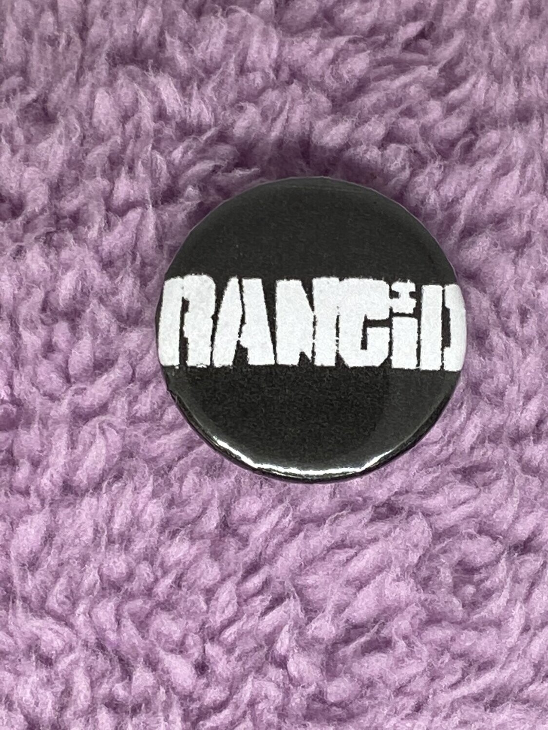 Rancid Badge