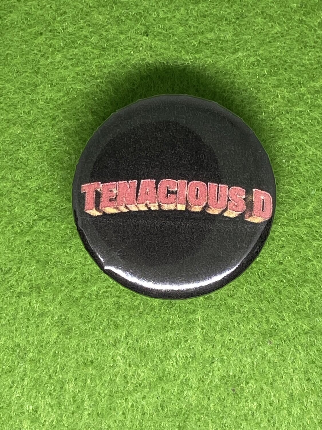 Tenacious D Badge