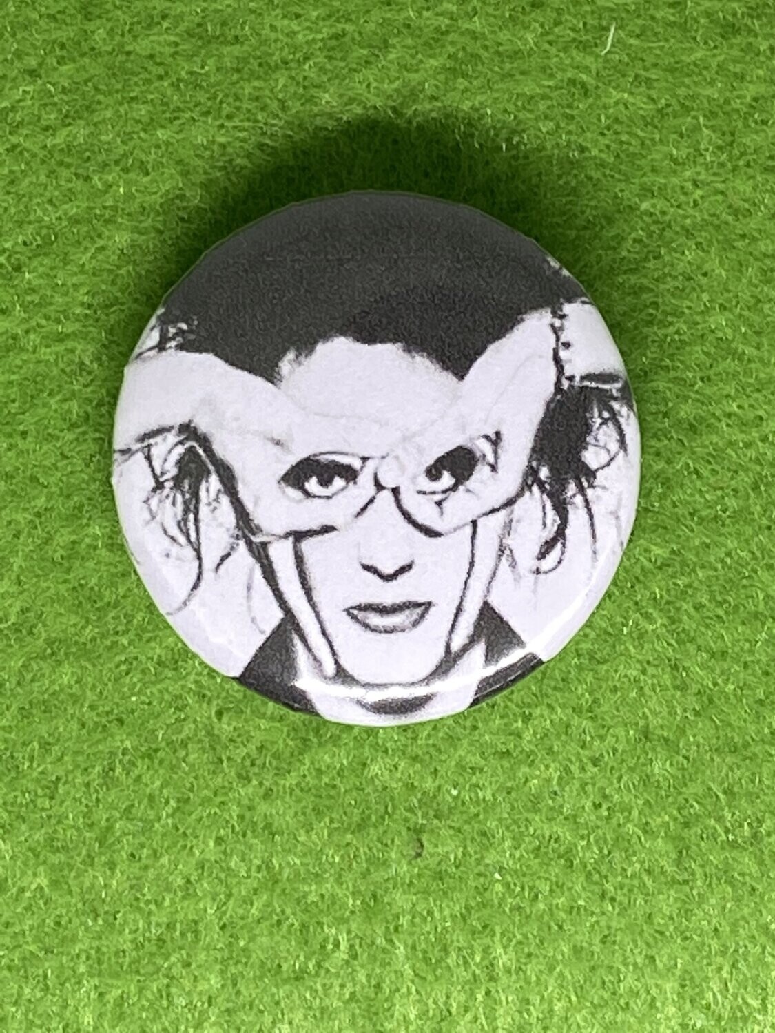 The Cure Badge