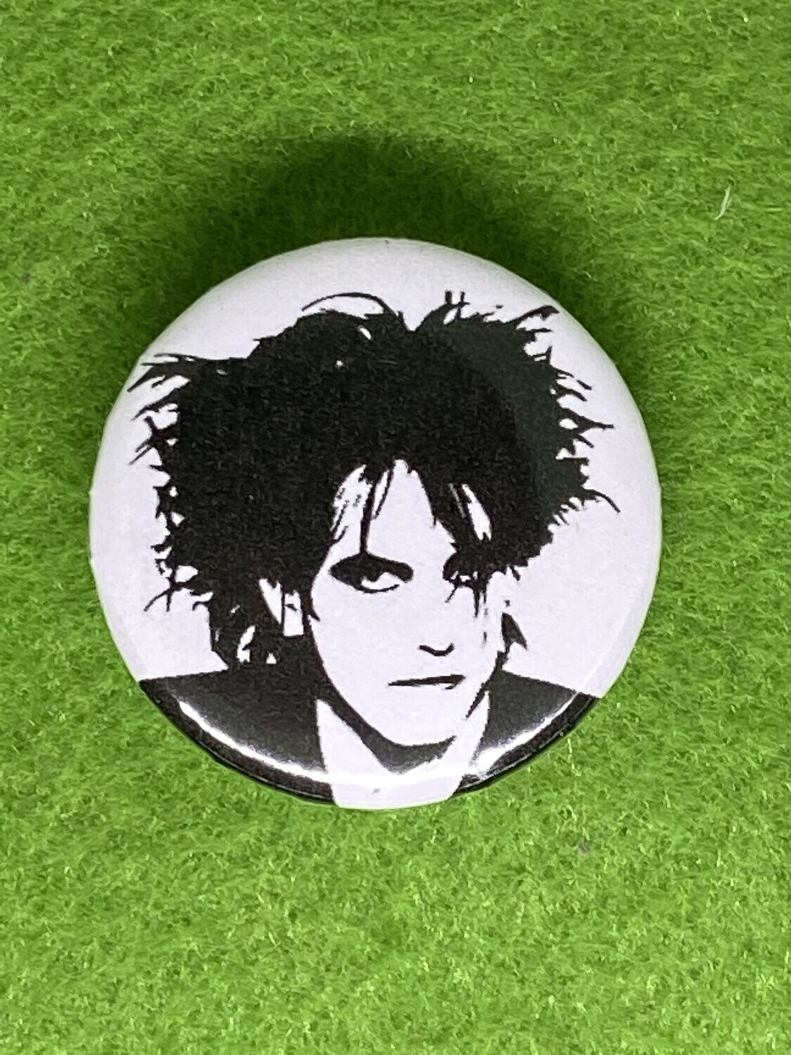 The Cure Badge