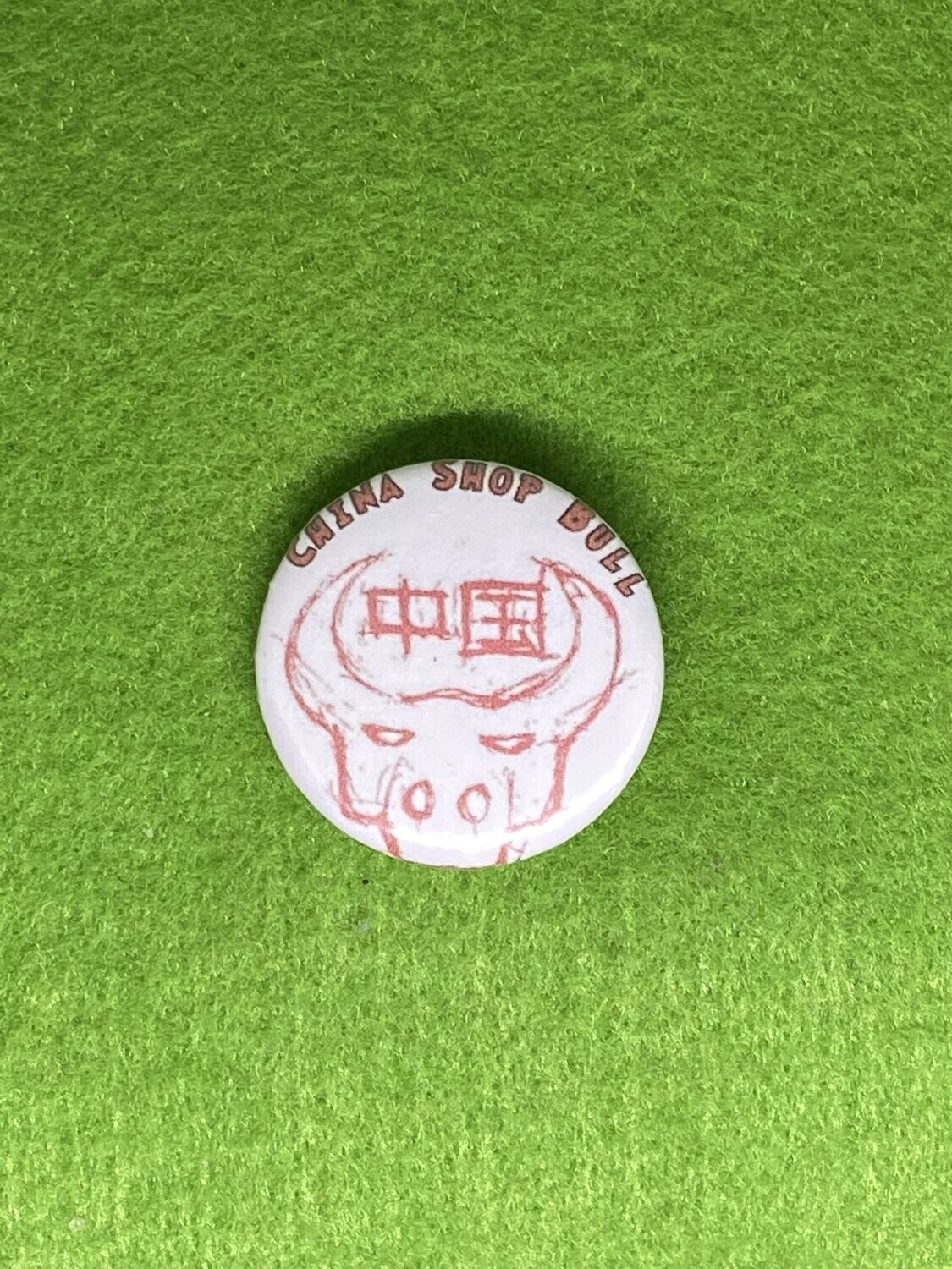 China Shop Bull Badge