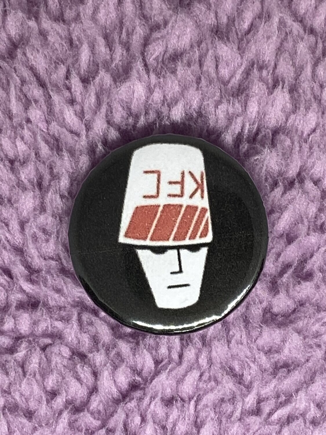 Buckethead Badge