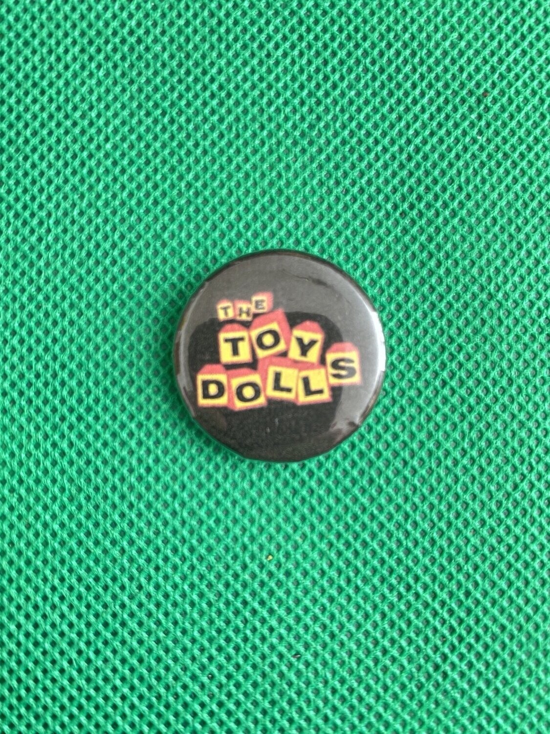 The Toy Doll's Badge
