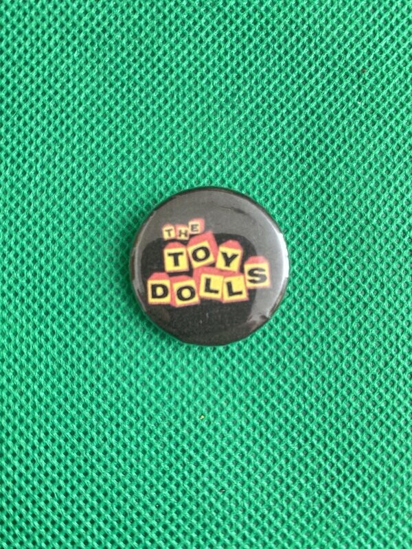 The Toy Doll's Badge