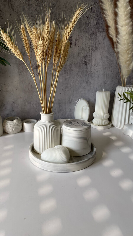 5. Home Decor with 2 Candles on a Round Stand