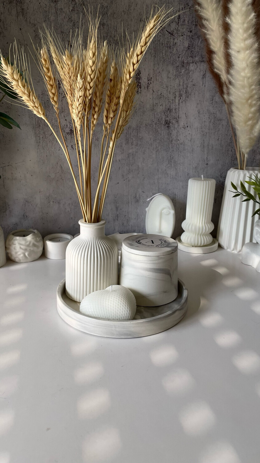 5. Home Decor with 2 Candles on a Round Stand