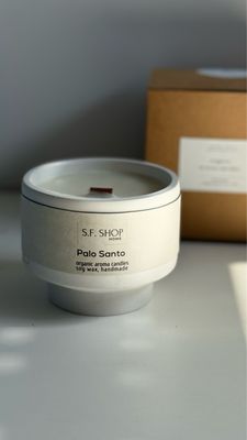 Aroma candle in a plaster glass on a leg