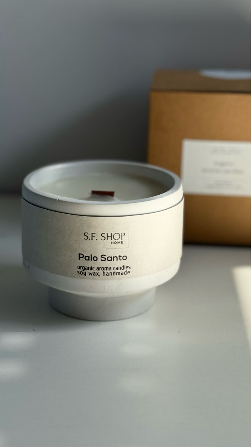 Aroma candle in a plaster glass on a leg
