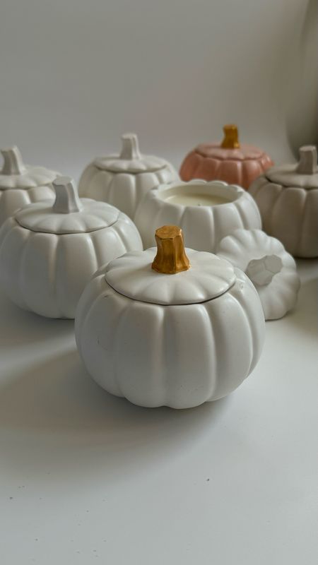 Scented candle in a pumpkin candlestick
